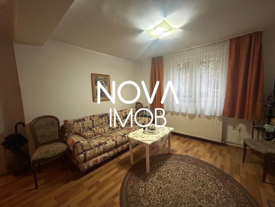 Casa de vanzare 200 mp cu spatiu comercial la parter, strada Lunga