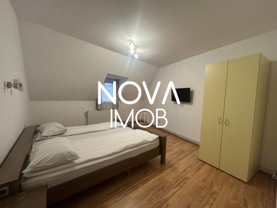 Casa de vanzare 200 mp cu spatiu comercial la parter, strada Lunga