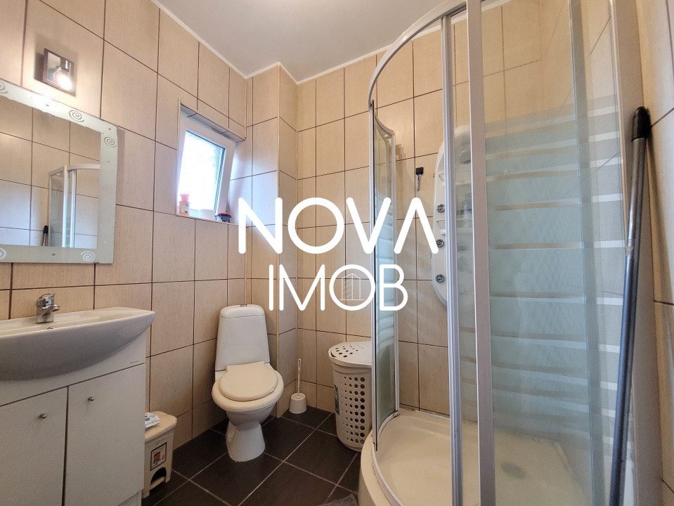 Casa tip duplex cu garaj si deschidere la 2 strazi