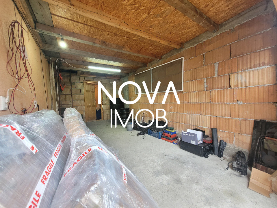 Casa tip duplex cu garaj si deschidere la 2 strazi